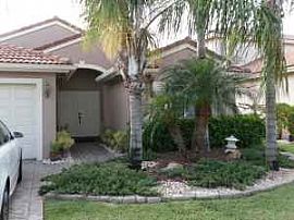 Immaculate 3 Bedroom Pool and Lake Home in Tropical Oasis in Coconut Creek, FL