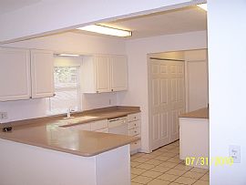 Terrific 3 Bedroom Home with 1 Car Garage with Fenced Yard in Palm Bay, FL (Photo 5 of 8)