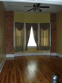 Beautiful, Remodeled 2 Bedroom Townhouse with Hardwood Floors in Baltimore, MD (Photo 5 of 11)