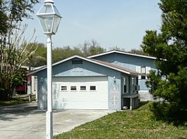 Gorgeous 3 Bedroom Canal Front Home with Dock in Oak Hill, FL (Photo 4 of 8)
