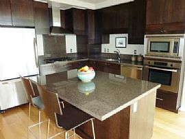 Gorgeous 1 Bedroom Condo with River View By Marina in Portland, OR (Photo 2 of 7)