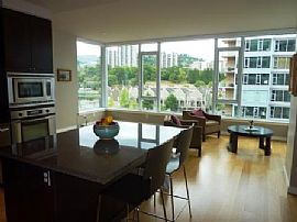 Gorgeous 1 Bedroom Condo with River View By Marina in Portland, OR (Photo 3 of 7)