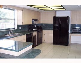 Picture Perfect 4 Bedroom Home with Pool and Lease Option in Largo, FL (Photo 3 of 9)