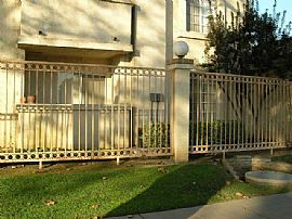 Sharp 3 Bedroom Townhouse with Hardwood Flooring  in Paramount, CA