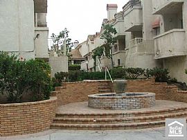 Sharp 3 Bedroom Townhouse with Hardwood Flooring  in Paramount, CA (Photo 2 of 3)