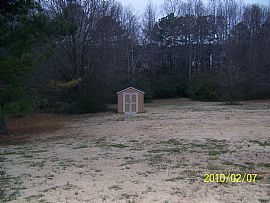 Beautiful 4 Bedroom Home 2 Car Garage and Hardwood Floors in Powder Springs, GA (Photo 2 of 6)