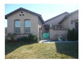Quiet 5 Bedroom Home with Immaculate Living Room and Fireplace in Victorville, CA (Photo 2 of 2)