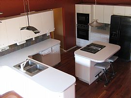 Secluded 4 Bedroom Home with Pool and Hardwood Floors in Lenexa, KS (Photo 2 of 8)