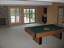 Secluded 4 Bedroom Home with Pool and Hardwood Floors in Lenexa, KS (Photo 3 of 8)