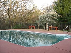 Secluded 4 Bedroom Home with Pool and Hardwood Floors in Lenexa, KS (Photo 4 of 8)