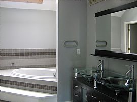 Secluded 4 Bedroom Home with Pool and Hardwood Floors in Lenexa, KS (Photo 7 of 8)