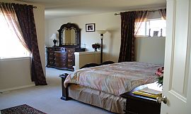 Beautiful 4 Bedroom Home with Hardwood Floors and Central Air in Redmond, WA (Photo 3 of 6)