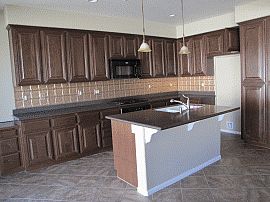 Exciting 4 Bedroom Home with Many Windows in Bakersfield, CA (Photo 2 of 2)