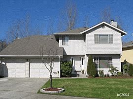 4 Bedroom Home with Pretty Front Yard in Federal Way, WA