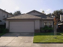 Terrific 3 Bedroom Home with Pretty Green Grass in Elk Grove, CA