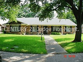 Pleasant 4 Bedroom Home with Brick Fireplace in Dallas, TX