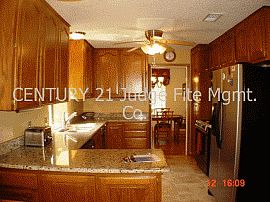 Pleasant 4 Bedroom Home with Brick Fireplace in Dallas, TX (Photo 2 of 2)