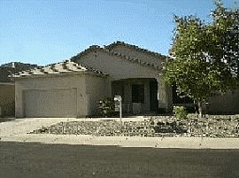 Appealing 4 Bedroom Home with Covered Front Porch in Laveen, AZ