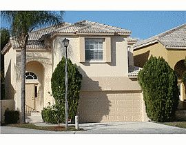 Majestic 4 Bedroom Home with Enclosed Patio in Coconut Creek, FL