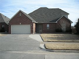 Ideal 4 Bedroom Home with Red Brick Fireplace in Moore, OK