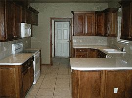 Ideal 4 Bedroom Home with Red Brick Fireplace in Moore, OK (Photo 2 of 2)