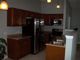 Sharp 3 Bedroom Home with Stainless Steel Appliances in Kitchen in Deltona, FL (Photo 2 of 2)