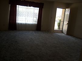 Nice 3 BR Home with Yard 	and Garage Near School in Joshua Tree, CA (Photo 3 of 4)