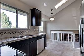 Bright, Clean 4 BR Home with New Everything for Your Enjoyment!  in Centennial, CO (Photo 6 of 12)