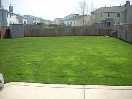 2 BR, 1.5 BA Townhouse with Full Fences and Yard, Wood Floors  in Montgomery, IL (Photo 1 of 10)