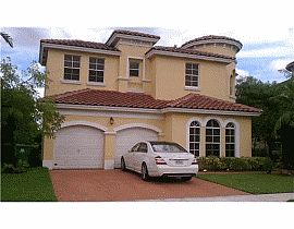 Massive 5 Bedroom Castle Style Home with Gorgeous Yard in Miramar, FL