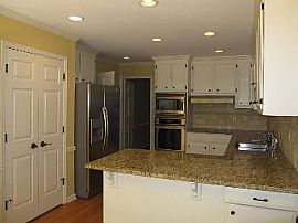 Beautiful Home with Private Living Backyard in Roswell, GA (Photo 2 of 3)