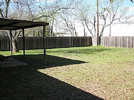 Three Bedroom Two Bath Home with a Two Car Garage and Large Fen in College Station, TX (Photo 3 of 4)