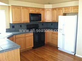 Broadmoor Glen Area Ranch Style Home Wit in Colorado Springs, CO (Photo 3 of 4)