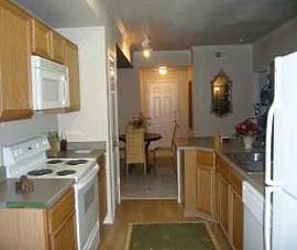 Refreshing Pool with Outdoor Fireplace A in Dallas, TX (Photo 2 of 5)