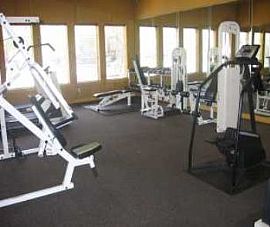 Refreshing Pool with Outdoor Fireplace A in Dallas, TX (Photo 5 of 5)