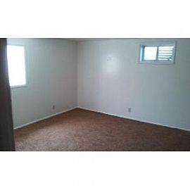 Home/triplex in Rigby in Annis, ID (Photo 2 of 5)