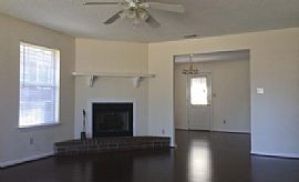 This Home Features a Large Living Room, Dining Room