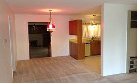 This 3br, 2ba, Home Features 2 Living Areas Both with Wood Burn
