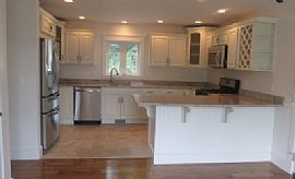 The Homes Feature Hardwood Floors, Granite Counters Throughou
