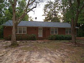Secluded Brick Home with 5 Acres with a Pond View, Large Sun Ro