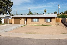 Beautifully Renovated 4 Bed/2 Bath Home in Phoenix, Az with Til