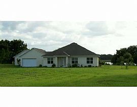 lakefront home on 5 acres 4/3 and 3 car