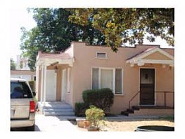 Charming Spanish Style 2 Bedroom Home - Freshly Painted 