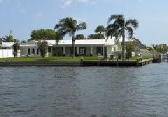 Upgraded, Furnished 4 Bedroom Riverfront Home with Dock!