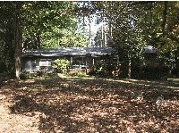 Secluded 3 Br Property Covered with Trees!