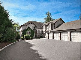 Magnificent 4 Bedroom Home with 4 Car Garage 