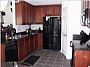 Kitchen with black units